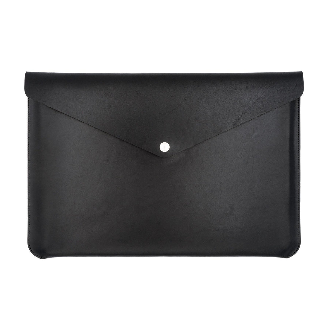 Geöffnete schwarze Laptoptasche mit Druckknopf für MacBook und MacBook Pro 13 Zoll aus pflanzlich gegerbtem Leder
